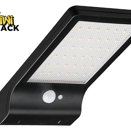 Black solar wall light with motion sensor on a white background, featuring the Kiwi Shack brand.