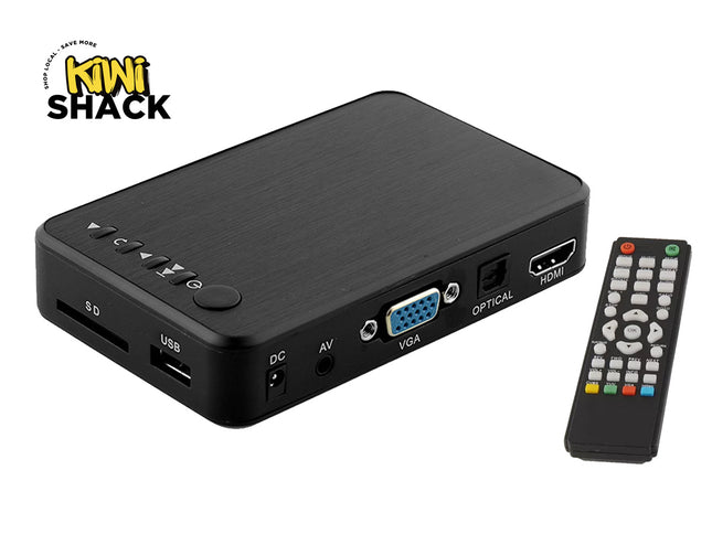 Black electronic device with ports and a remote control on a white background, featuring the Kiwi Shack logo.