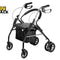 A black and silver rollator walker with a seat, four wheels, and a storage basket, shown on a white background with the Kiwi Shack logo in the top left corner.