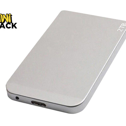 A sleek, silver 2TB portable external hard drive featuring a USB-C port and a status indicator light on the end against a white background, featuring the "Kiwi Shack" logo in the upper left corner.
