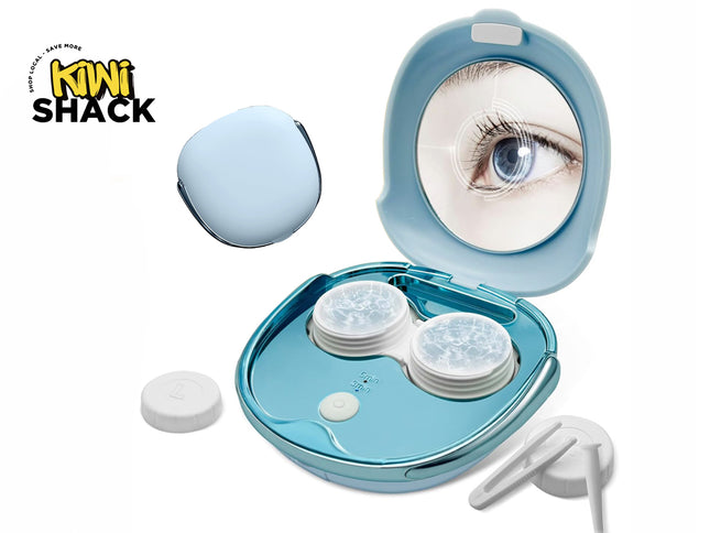 Light blue/teal portable ultrasonic contact lens cleaning case laid open with an integrated lid mirror showing an eye reflection graphic, dual rotating/vibrating holder cups with translucent covers, power button ("5 min / 3 min" text), separate closed light-blue outer casing top piece lying nearby, white applicator tool/tweezers, and the Kiwi Shack logo watermark.