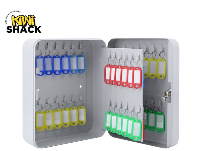Key cabinet with multiple key slots containing keys of different colors, branded 'Kiwi Shack'.