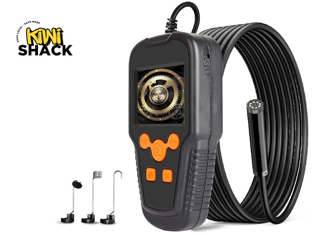 Black endoscope camera with a coiled black cable, orange buttons, and a gear graphic on the screen, shown with three attachment heads and a Kiwi Shack logo on a white background.