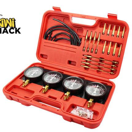 A Kini Shack automotive tire pressure monitoring system kit displayed in its red plastic carrying case, featuring four black gauges with brass fittings, black hoses, and brass arrow tips, on a white background with the Kini Shack logo in the top-left corner.