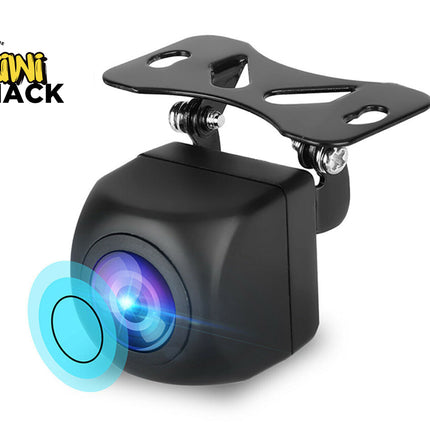 A black mini car rear-view backup camera with a mounting bracket, shown on a white background with a blue lens flare graphic and a Kiwi Shack logo in the top-left corner.