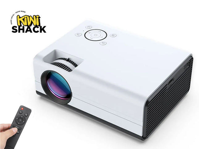 White projector with remote control on a white background, branded 'Kiwi Shack'.