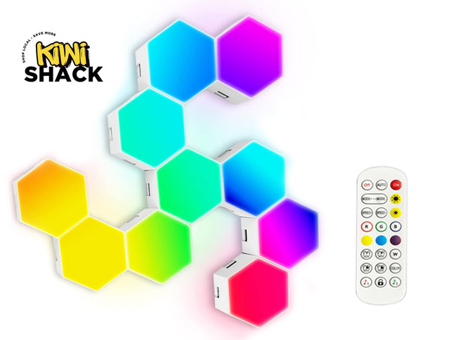 A set of six Kiwi Shack hexagonal smart wall lights in a connected cluster, displaying a vibrant rainbow color-changing gradient, shown alongside a white remote control and the brand logo on a white background.