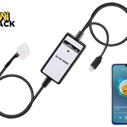 A black car aux adapter module labeled "Car Aux Adapter" connected via cables to a white vehicle wiring harness on one end and a smartphone playing music on the other, set against a plain background with the "Kiwi Shack" logo in the top left corner.