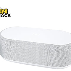 A modern white oval-shaped bedside smart speaker wrapped in textured gray acoustic fabric, featuring a wireless charging pad surface on top and a "Kiwi Shack" logo in the top left corner.