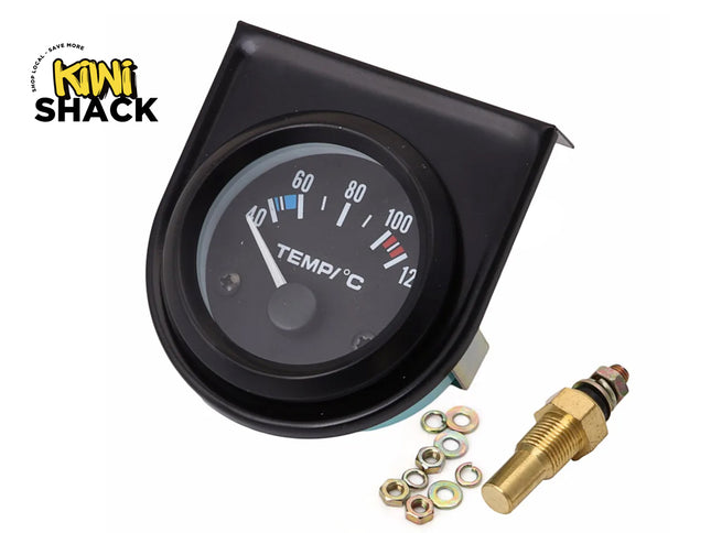 Black automotive temperature gauge with mounting bracket, sensor probe, and hardware, with the Kiwi Shack logo in the top left.