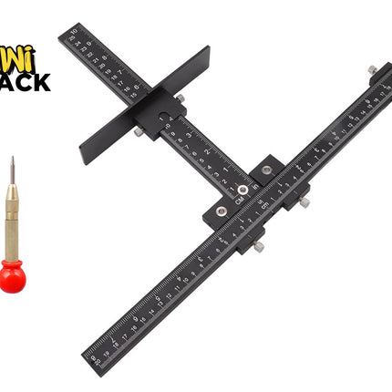 A black metal caliper-style measuring tool with engraved measurement markings, shown on a white background. A small screwdriver with a red handle is pictured to the left, and the Kiwi Shack logo appears in the upper left corner.