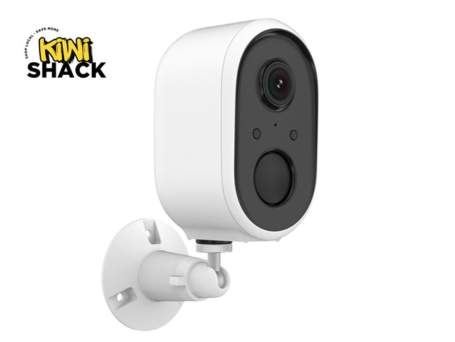 White security camera with black lens on a white background, featuring the Kiwi Shack logo.