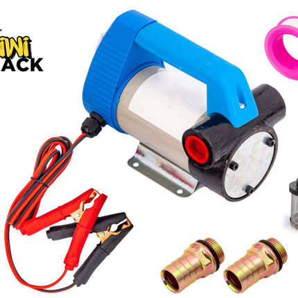 A portable 12V electric transfer pump kit with a blue handle, wired battery alligator clips, hose fittings, a filter screen, and sealing tape, featuring a "Kiwi Shack" logo in the top left corner.