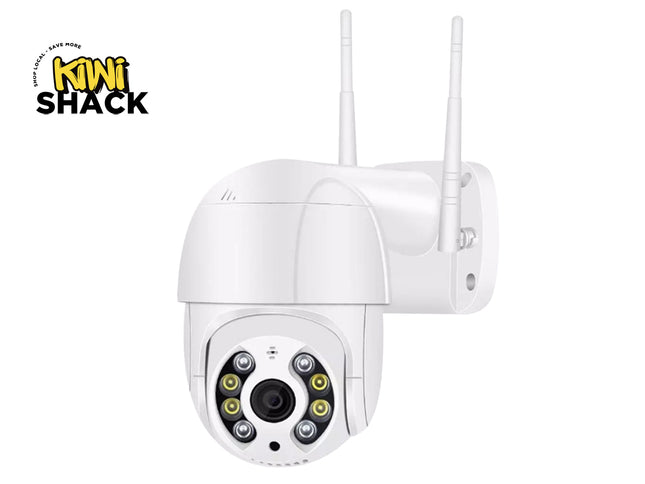 White wireless security camera with dual antennas and a circular array of infrared LEDs, shown on a white background with a Kiwi Shack logo in the top-left corner.