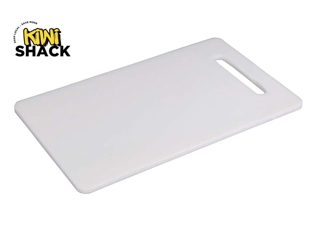 A plain white plastic cutting board with a convenient integrated handle slot, featuring the "Kiwi Shack" logo in the top-left corner.