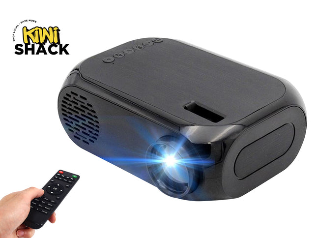 Black portable projector with remote control on a white background, featuring the Kiwi Shack brand.
