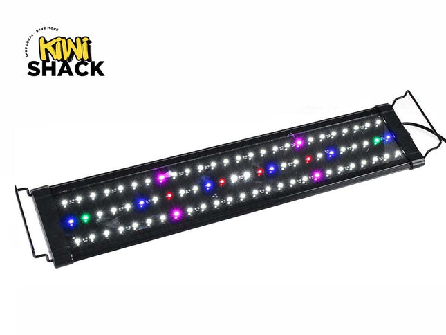 A rectangular black LED aquarium light fixture with extending wire brackets on the ends and multiple rows of white, blue, green, red, and purple LEDs illuminated against a white background, featuring the "Kiwi Shack" logo in the upper left corner.