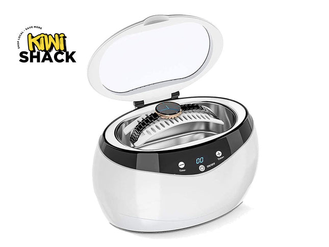 Ultrasonic cleaner with a watch inside, branded 'Kiwi Shack'.