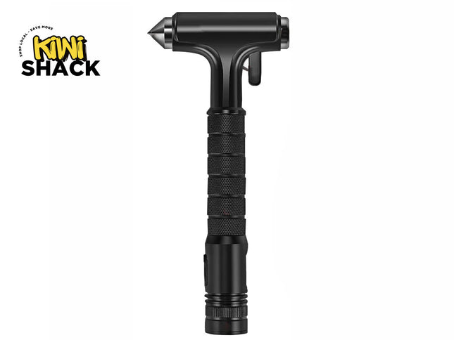 Black multi-function emergency escape tool featuring a spring-loaded window glass breaker point, textured grip handle, and integrated tactical light or cutter element, branded with the "Kiwi Shack" logo in the top-left corner.