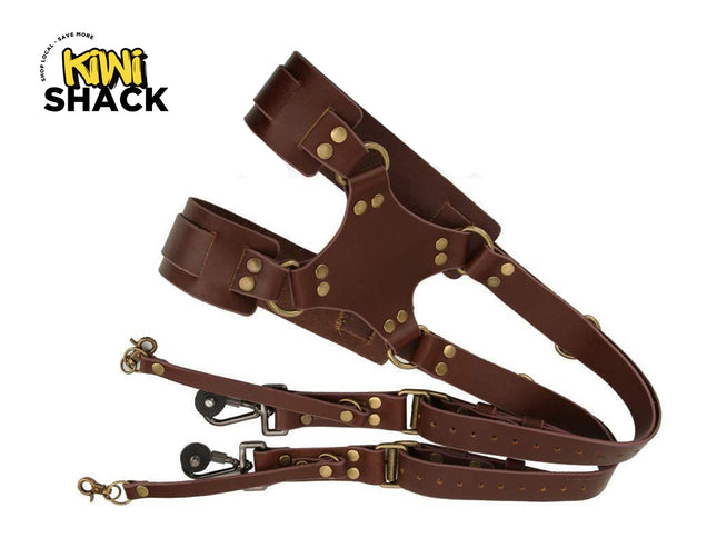 Brown leather harness with gold hardware on a white background, featuring the Kiwi Shack logo.