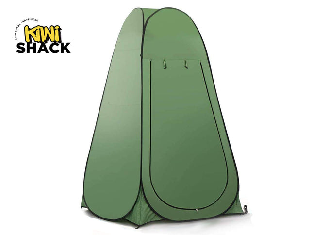 A portable green pop-up privacy tent used for changing or showering outdoors, featuring the "Kiwi Shack" logo in the top-left corner.
