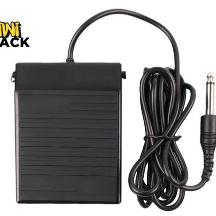 Concise Alt Text (Screen Readers)
Black rectangular foot pedal with horizontal ribbed surface texture, connected via a coiled/looped black cable to a 6.35mm 1/4-inch mono audio jack plug, featuring the Kiwi Shack logo in the top left.