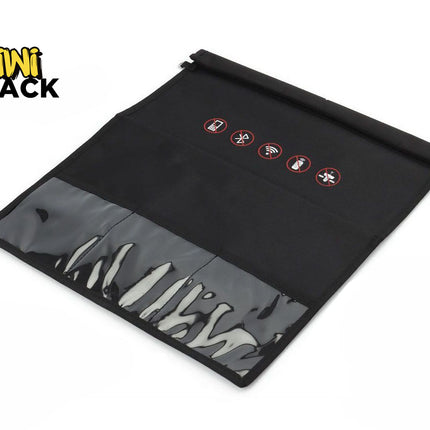 A black fabric tool roll with a clear plastic front pocket showing white-handled tools inside, photographed on a white background. The Kiwi Shack logo is visible in the top-left corner.