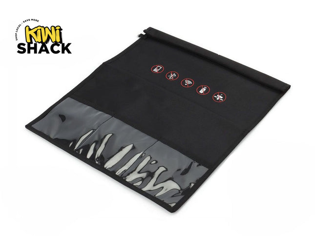 A black fabric tool roll with a clear plastic front pocket showing white-handled tools inside, photographed on a white background. The Kiwi Shack logo is visible in the top-left corner.