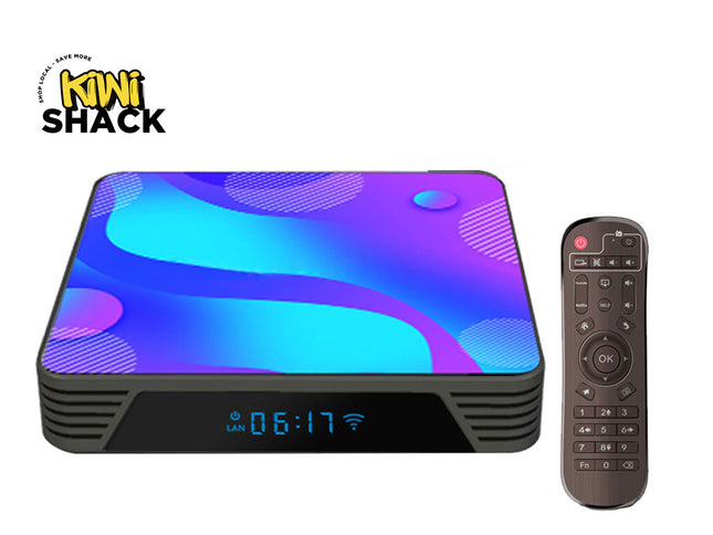 A Kiwi Shack streaming box with a colorful purple and blue abstract patterned top, shown next to its matching remote control on a white background.