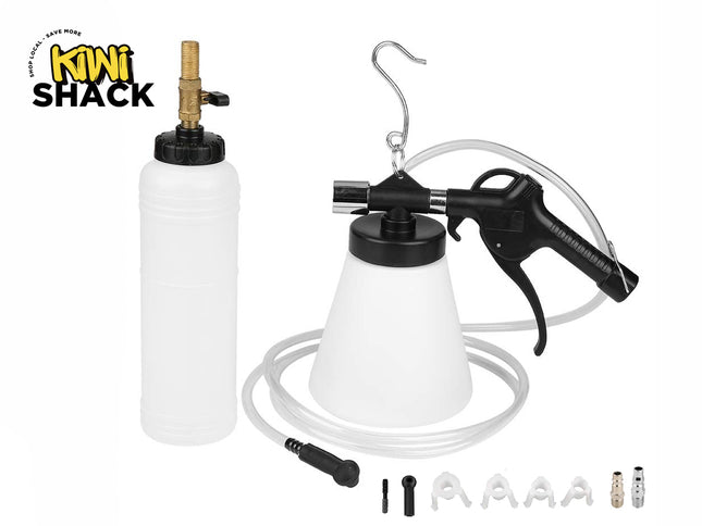 A pneumatic brake fluid bleeder kit consisting of a refill bottle with a brass valve, a handheld extraction gun with a fluid container and hanging hook, clear silicone tubing, and various adapter fittings against a white background. A "Kiwi Shack" logo appears in the top-left corner.