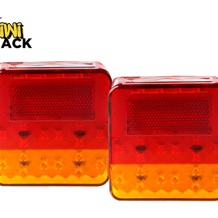 Pair of square red and amber trailer tail lights with reflectors, featuring the Kiwi Shack logo in the top left.
