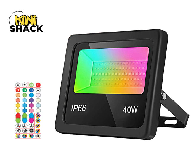 A black 40W IP66 outdoor LED floodlight by Kiwi Shack, featuring a colorful gradient display window and a mounting bracket, shown alongside a color selection chart on a white background.