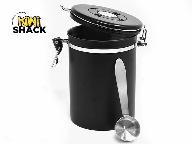 Kiwi Shack airtight stainless steel coffee storage canister with date tracker lid, locking clasp, and matching scoop.