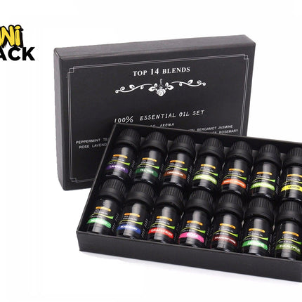 A gift set of 14 dark glass essential oil bottles arranged neatly inside an open black presentation box with white lettering, set against a white background. A "Kiwi Shack" logo appears in the top-left corner.