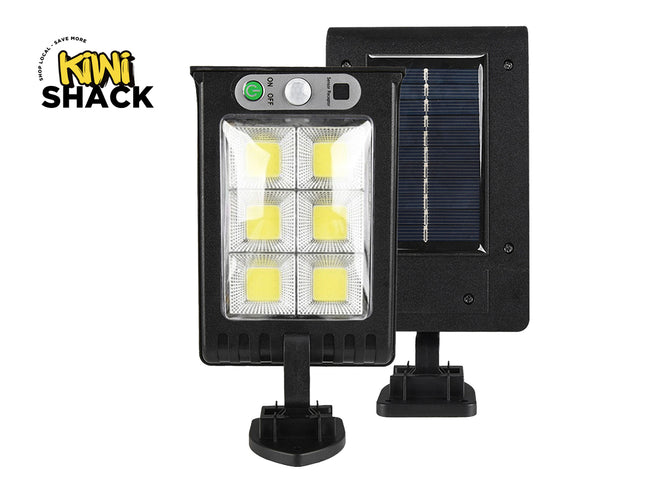Solar-powered LED light with solar panel and Kiwi Shack branding on a white background