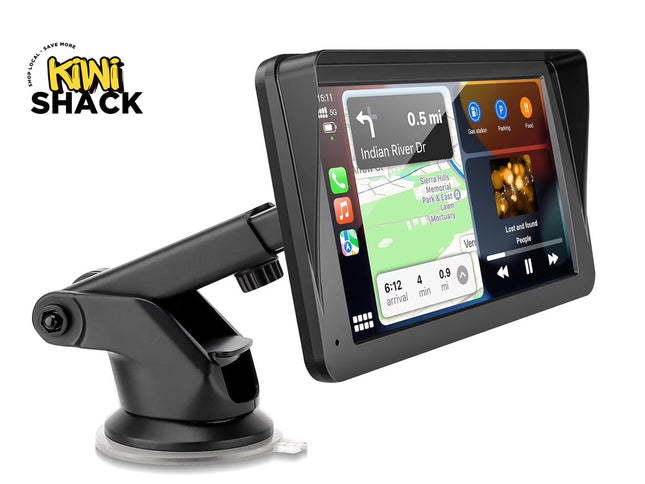 Portable wireless carplay / android auto touchscreen display with a sunshade visor mounted on an adjustable suction cup pedestal stand, showing a navigation and media interface, with Kiwi Shack logo in top left.