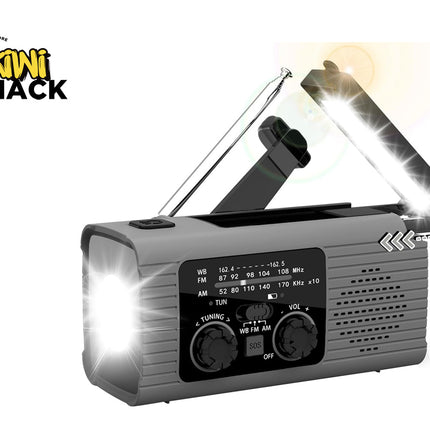 A gray Kiwi Shack emergency radio with a folding solar panel on top, a telescoping antenna, and bright light effects on the front and side, shown on a white background with the Kiwi Shack logo in the top left.