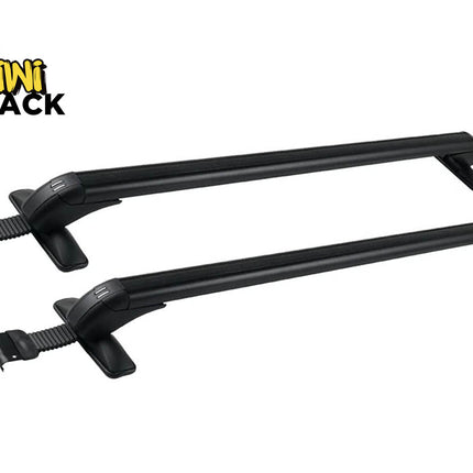 Two black roof rack crossbars shown on a plain white background, with the Kiwi Shack logo in the top-left corner.