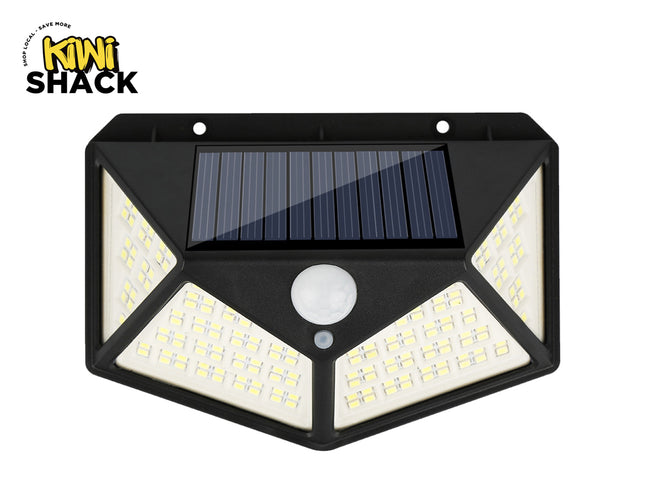 Solar-powered outdoor light with motion sensor on a white background, branded as Kiwi Shack.