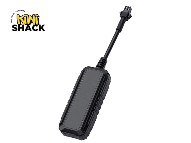 A black wired GPS tracker device featuring a rugged rectangular main module with ribbed sides and an attached short cable with a multi-pin connector against a white background, featuring the "Kiwi Shack" logo in the upper left corner.