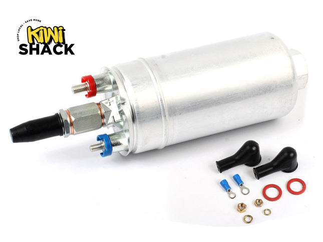 An aluminum fuel pump kit by Kiwi Shack, featuring a cylindrical silver metal pump with red and blue threaded fittings, a black nozzle, and various mounting hardware and gaskets on a white background.