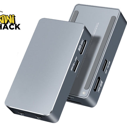 Two metallic gray USB hubs with multiple ports on a white background, featuring the Kiwi Shack logo.