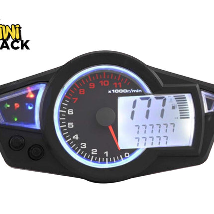 A black motorcycle or scooter dashboard instrument cluster with a tachometer, illuminated blue ring, and a digital display screen, shown on a white background with a Kiwi Shack logo in the top-left corner.
