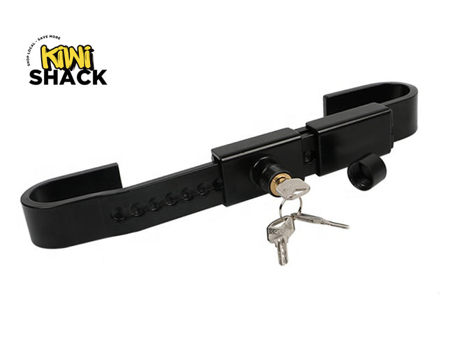 A black metal hitch receiver lock with two keys, shown on a white background with the Kiwi Shack logo in the top-left corner.