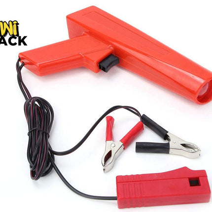 Red battery jump starter with clamps on a white background, branded 'Kiwi Shack'.