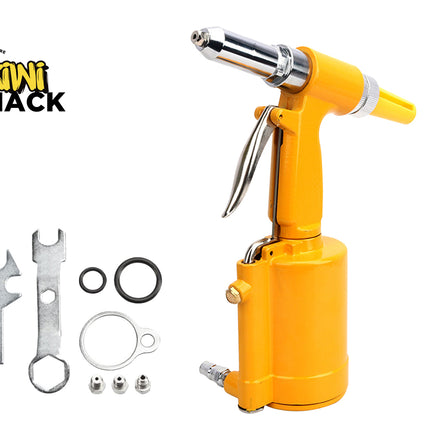 A bright yellow pneumatic air rivet gun with a chrome bit attachment, shown alongside included metal wrenches, washers, O-rings, and small fasteners on a white background. The Kiwi Shack logo is visible in the upper left.