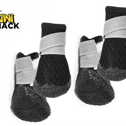 A set of four black dog booties featuring textured rubber soles and adjustable gray strap closures, set against a white background with the "Kiwi Shack" logo in the top left corner.