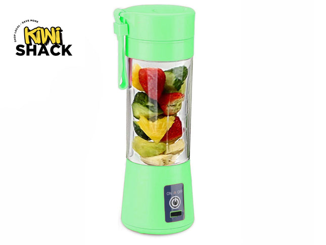 A mint green portable mini blender with a clear cup filled with sliced fruits, shown on a white background with the Kiwi Shack logo in the top-left corner.