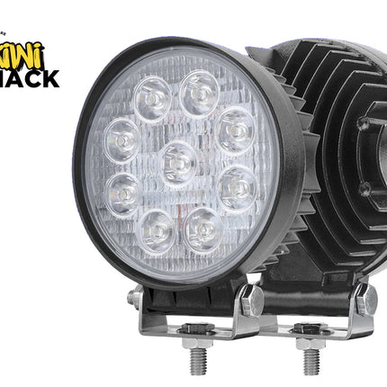 Round LED work light with black housing on a white background, featuring the Kiwi Shack logo.