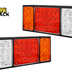 A pair of rectangular LED trailer tail lights with black housings against a white background, featuring amber, red, and white indicator/brake sections, with the "Kiwi Shack" logo in the upper left corner.